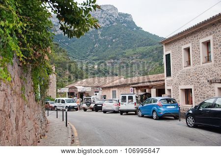 Cars parked along the main street