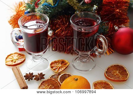mulled wine with decorated christmas tree