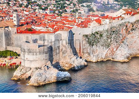 Dubrovnik Croatia - Sunset summer light on medieval walled city of Ragusa Dalmatia.