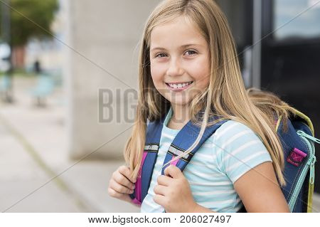 A nine years old girl student at school