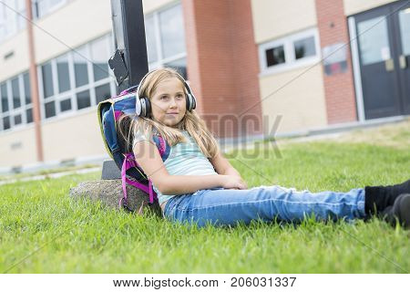 A nine years old girl student at school