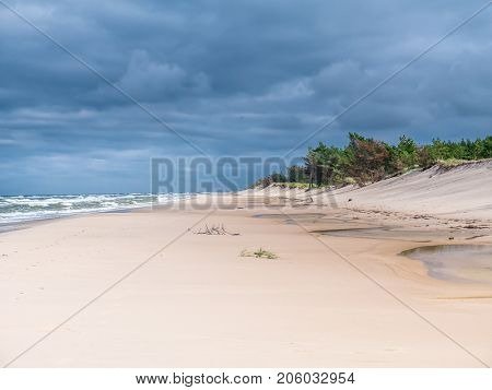 Beautiful wide sand beach, part of the Slowinski National Park between Rowy and Leba, Baltic Sea, Poland