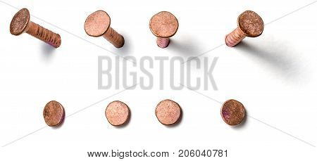 Copper Nail From Different Perspectives On A White Background