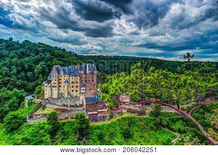Eltz Castle in Rhineland-Palatinate, Germany. Beautiful landscape with medieval architecture.