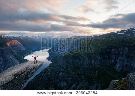 Alone tourist on Trolltunga rock