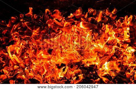 background of burning coals . Photo of an abstract texture