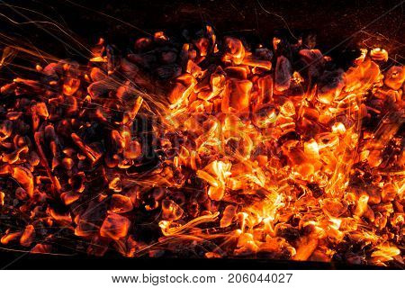 abstract background of burning coals . Photo of an abstract texture