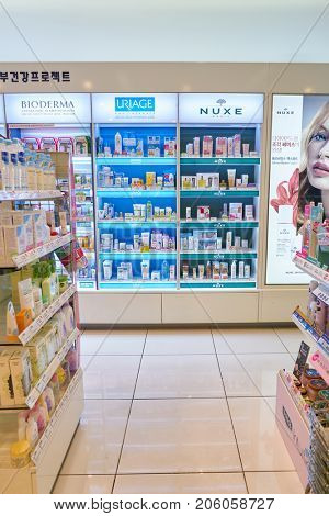 BUSAN, SOUTH KOREA - MAY 28, 2017: cosmetic products sit on display for sale at Olive Young shop at Lotte Department Store in Busan.