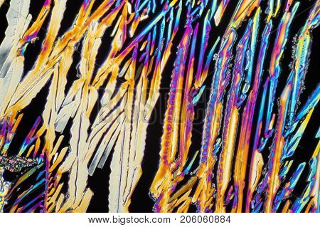 colorful microscopic shot of Sodium nitrate microcrystals in polarized light