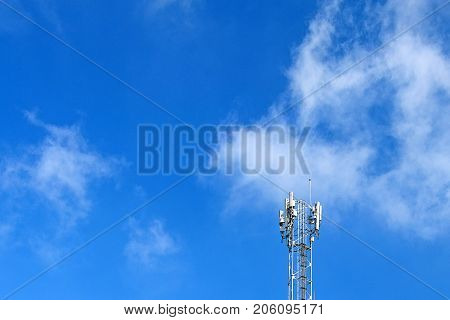 The telecommunication tower with beautiful blue sky