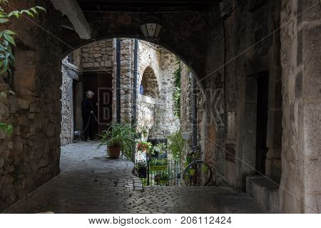 TOURRETTES-SUR-LOUP, FRANCE - APRIL 25, 2016: Street of Tourrettes-sur-Loup a medieval village in the Alpes-Maritimes department in southeastern France
