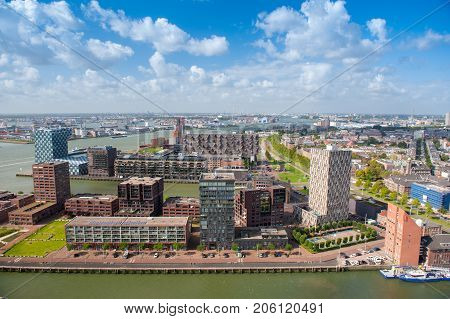 Aerial panoramic view of Rotterdam, The Netherlands, Holland. Rotterdam skyline with harbor. A major logistic and economic centre, Rotterdam is Europe's largest port and has a population of 633,471.