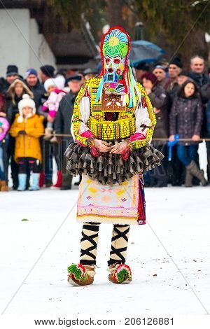 Razlog, Bulgaria - January 14, 2017: People in traditional carnival kuker costumes at Kukeri festival Starchevata