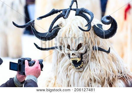 Razlog, Bulgaria - January 14, 2017: Traditional carnival kuker costume at Kukeri festival Starchevata