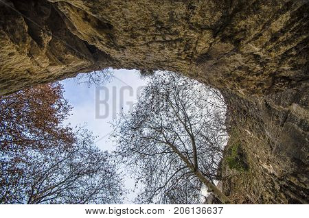 Rocky Cave With Trees Overlooking To The Sky. Gazakh Damcili Azerbaijan