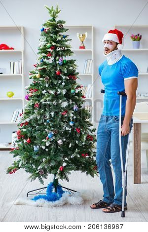 Injured man celebrating christmas at home
