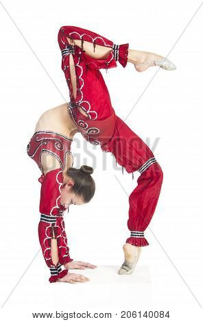 A Young Contortionist,circus Performer In A Red Suit.