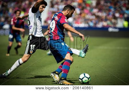 VALENCIA, SPAIN - SEPTEMBER 16: Pedro Lopez with ball during Spanish La Liga match between Levante Ud and Valencia CF at Ciutat de Valencia Stadium on September 16, 2017 in Valencia, Spain