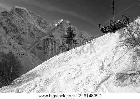 Black And White View On Old Chair Lift And Off-piste Ski Slope