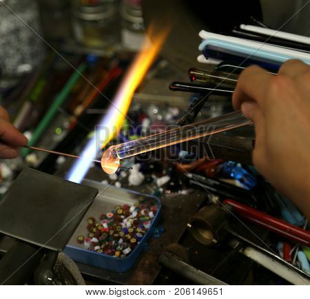 Glassworker Works With Hot Flame