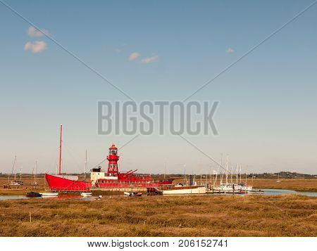 Red Life Boat Moored In Tollesbury Maldon Estuary Blue Sky