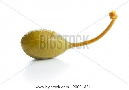 Pickled caper berries isolated on white background.