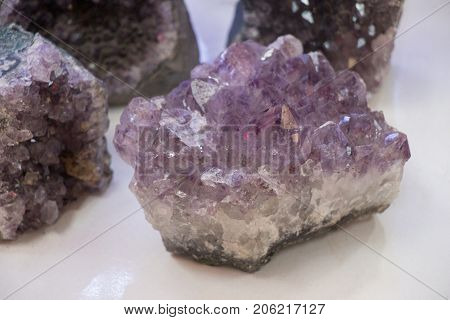 Raw violet amethyst rock with crystal ametist esoteric