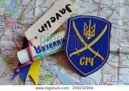 ILLUSTRATIVE EDITORIAL.Chevron of Ukrainian army. Javelin - USA FGM-148 anti-tank missile system,VASELINE - Petrolatum (RU). Kiev,Ukraine.September 22, 2017