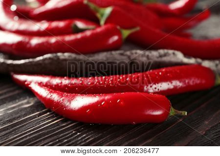 Red chili peppers on table, closeup