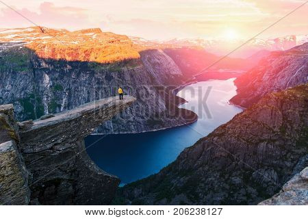 Alone tourist on Trolltunga rock
