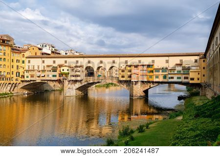 The Ponte Vecchio, a medieval bridge over the river Arno in the city of Florence, Italy