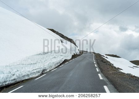 Norwegian Tourist Route Aurlandsfjellet runs from Aurlandsvangen to Laerdalsoyri. Snowy road Bjorgavegen