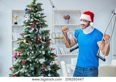 Injured man celebrating christmas at home