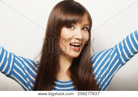 lifestyle and people concept: beautiful woman wearing casual clo