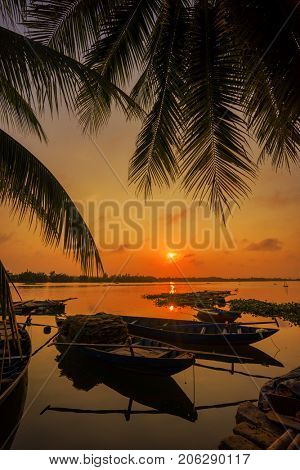 Vinh Cura Dai river in Hoi An Vietnam at sunset