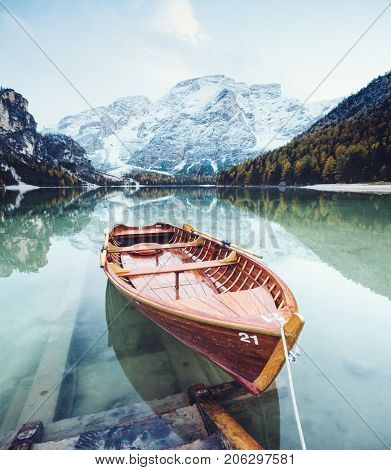 Great scene the alpine lake Braies (Pragser Wildsee). Location place Dolomite national park Fanes-Sennes-Braies, Italy. Europe. Retro and vintage style. Instagram effect. Explore the world's beauty.