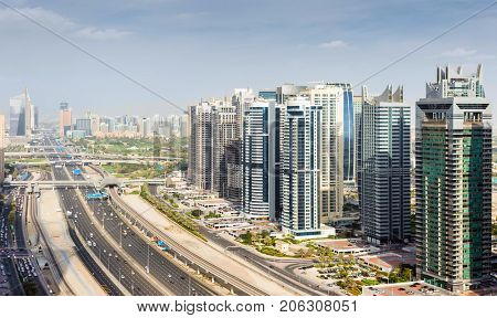 Sheikh Zayed Road and Dubai Marina area at suuny day in Dubai, UAE