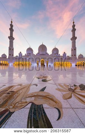 ABU DHABI, UAE - JAN 18, 2017: Evening Sheikh Zayed Mosque is one of six largest mosques in world, mosque was officially opened in 2007