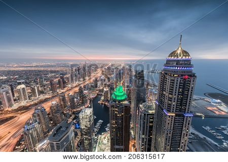 DUBAI, UAE - JAN 15, 2017: Princess tower and Dubai Marina, height of building is 414 m, with 101 floors - this is second tallest residential building in world