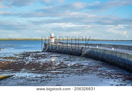 Small lighthouse in the seashore in the Isle of Man