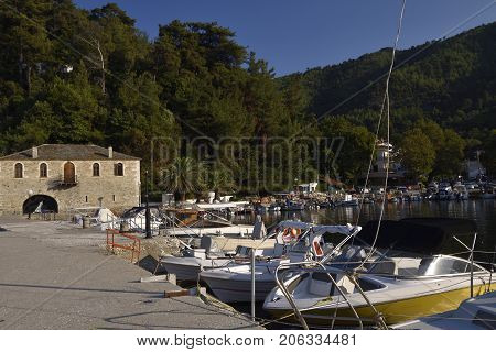 Harbor with boats in the Golden Beachpicture from Thassos Island Greece.