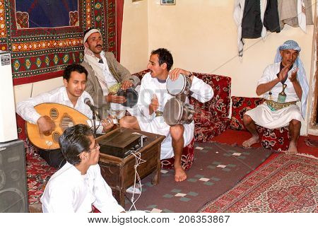 People Playing Traditional Music At Manakhah On Yemen