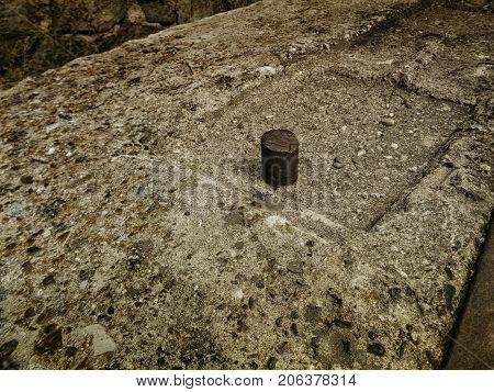 Concrete and metal. Concrete background. Grunge concrete. Grunge grey background. Ancient concrete. Fragment of the internal structure of the old fortifications in Ust-Kamenogorsk.