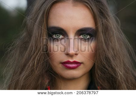 Portrait Of A Girl With Bright Make-up.