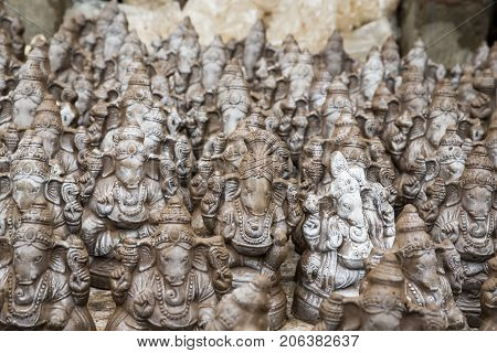 Many hand crafted Ganesha idol clay statues displayed in the market during Ganesh Festival.
