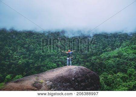 Asian women travel relax in the holiday. Standing on the mountain. Thailand