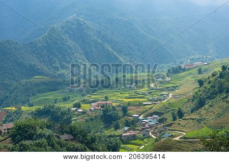 Spectacular View On Mountain Valley Village With Rice Terraces