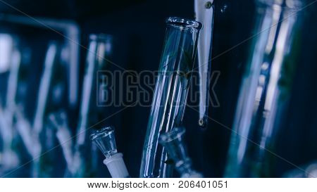 Glass Bongs For Smoking Weed Close-up Soft Focus. Smoking Accessories Marijuana