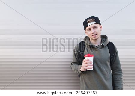 Young Asian Man drinking coffee in the morning.