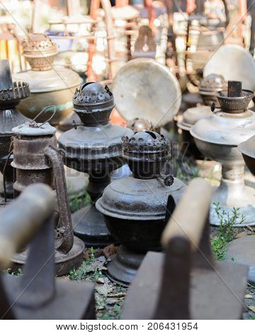 Dnipro, UKRAINE - September 2017: Flea market in Dnipro. Old vintage stuff for sale. Different used products: gas lamps, home utensils for sale on secondhand market in Dnipro, Ukraine.